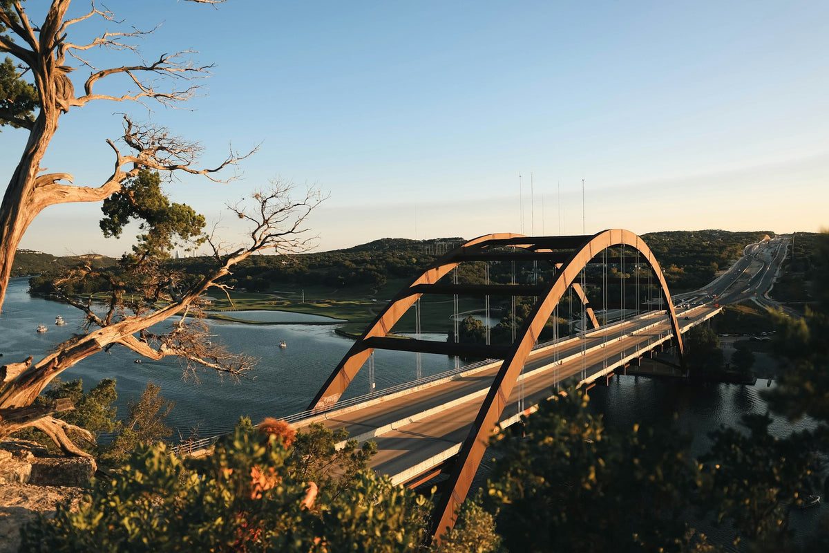 The Pennybacker Bridge over Lake Austin at golden hour